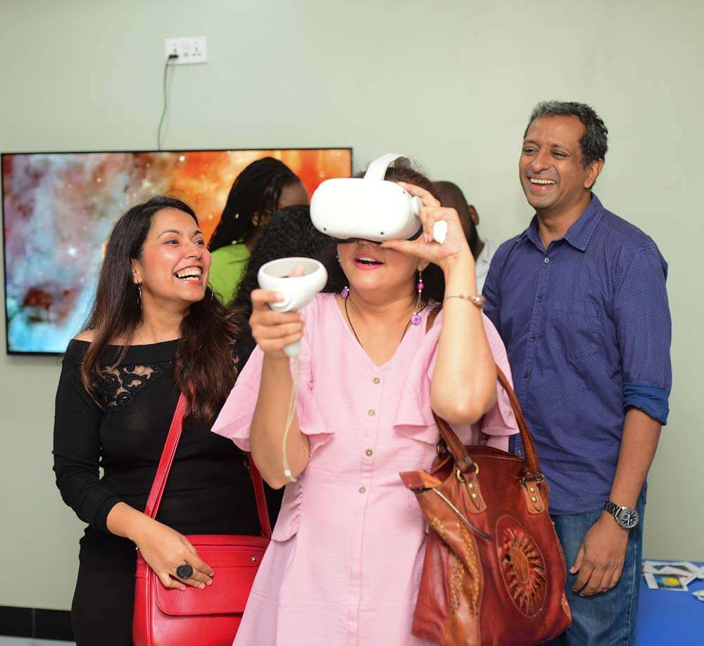 Visitors trying a virtual reality experience during STEM Park After Dark